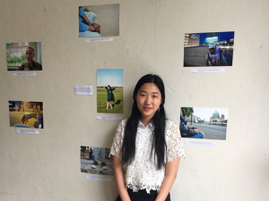 Wenqin Wang with Exhibit Photos